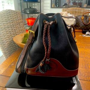 Vintage Dooney and Bourke Drawstring bag with burnt cedar trim